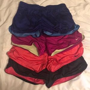 Four pair of Nike Dri-fit shorts